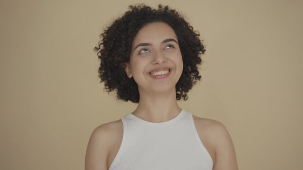 video of woman laughing with dental implants from Nottingham Implants